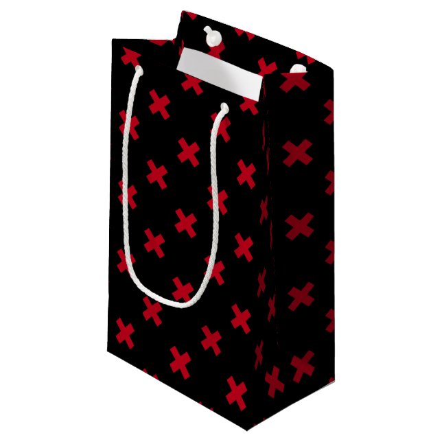 Red cross stitches on black small gift bag (Front Angled)