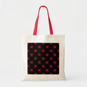 Red cross stitches on black tote bag