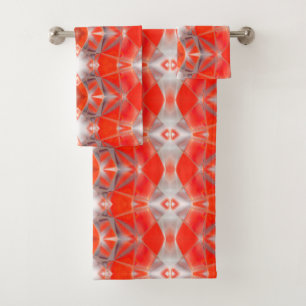Red curved shapes rapport floating over white grey bath towel set