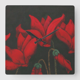 Red Cyclamen blossom on dark black background Square Wall Clock