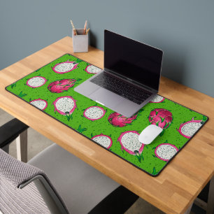 Red dragon fruit on green desk mat