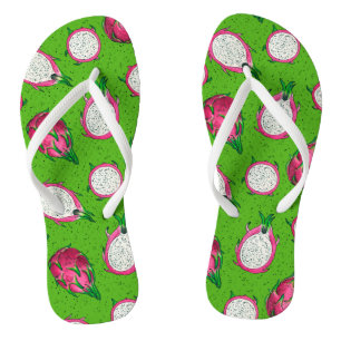 Red dragon fruit on green flip flops