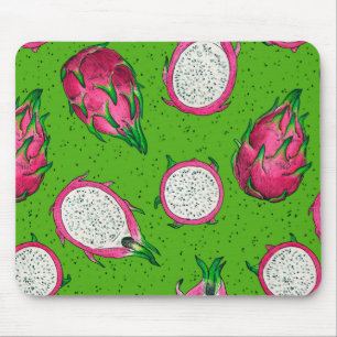 Red dragon fruit on green mouse mat