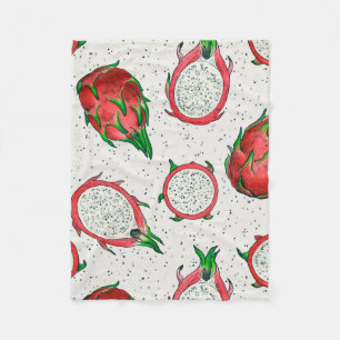 Red dragon fruit on off white fleece blanket