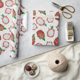 Red dragon fruit on off white wrapping paper