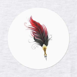 Red feather pen with gold nib