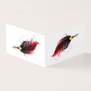 Red feather pen with gold nib