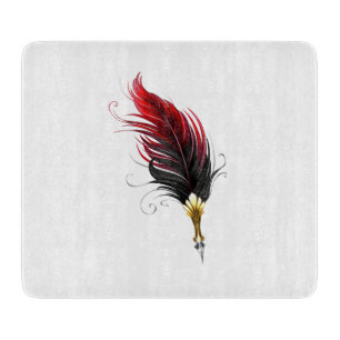 Red feather pen with gold nib cutting board