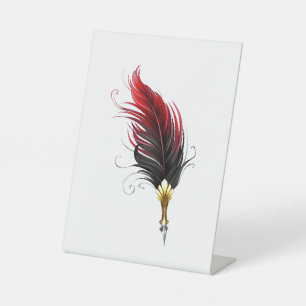 Red feather pen with gold nib pedestal sign