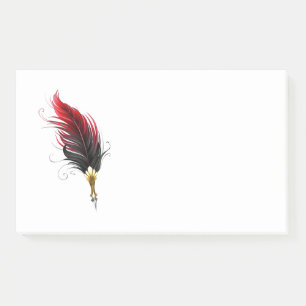 Red feather pen with gold nib post-it notes