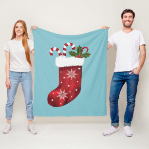 Red Festive Christmas Stocking On Blue Fleece Blanket
