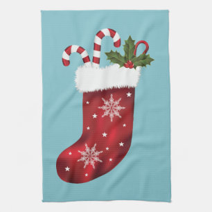 Red Festive Christmas Stocking On Blue Tea Towel
