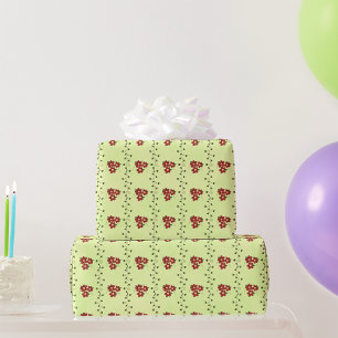 Red Floral Vine Pattern on Light Green Wrapping Paper