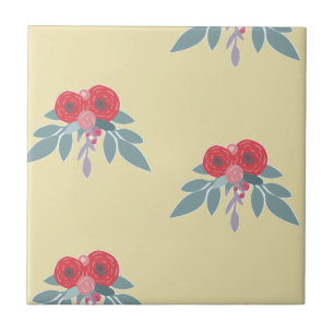 Red flowers and green leaves on brown tile