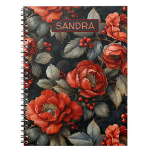 Red flowers on black notebook