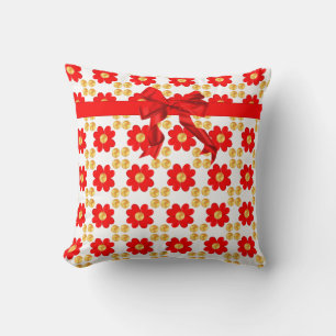 Red flowers & ribbon with golden dots on white cushion