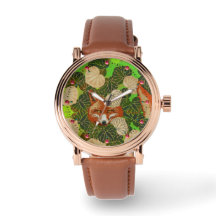 RED FOX AMONG THE GREEN LEAVES AND FOLIAGE