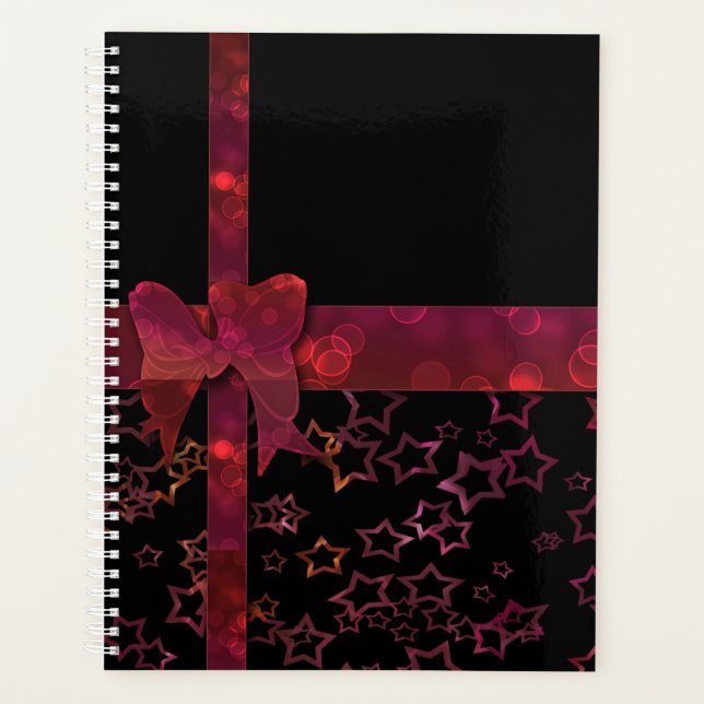 Red glitter bow and stars on black planner (Front)
