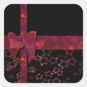 Red glitter bow and stars on black square sticker