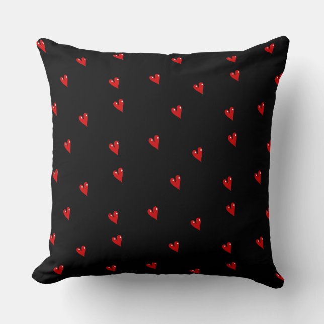 Red glossy hearts on black cushion (Front)