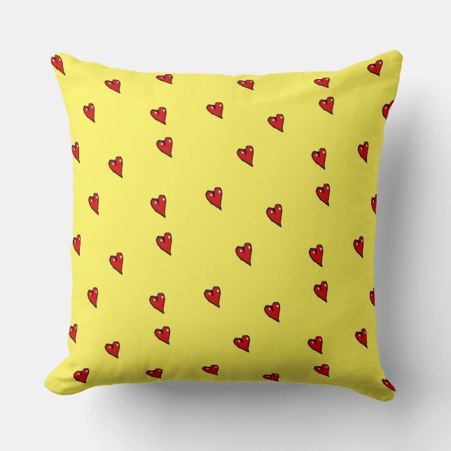 Red glossy hearts on yellow cushion (Front)