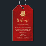 Red Gold Chinese Wedding Welcome Gift Tags<br><div class="desc">This Chinese wedding welcome gift tag features a red golden happiness symbol on a shimmering ruby red background. Personalise the tags with the location of your wedding,  a short welcome note,  your names,  and wedding date. These tags are perfect for destination weddings and hotel guest welcome bags.</div>
