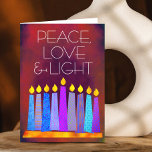 Red Hanukkah Blue Boho Candles Peace Love Light Holiday Card<br><div class="desc">“Peace, love & light.” A playful, modern, artsy illustration of boho pattern candles in a menorah helps you usher in the holiday of Hanukkah. Assorted blue candles with colourful faux foil patterns overlay a rich, deep burnt red orange textured background. Feel the warmth and joy of the holiday season whenever...</div>