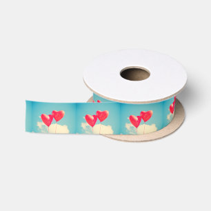 Red Heart Balloons Against Cloudy Sky Satin Ribbon