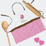 Red Heart Cupcake Monogram Apron<br><div class="desc">A child's apron designed with love and sprinkled with sweetness, this delightful apron features a charming pink frosted chocolate cupcake and a red heart set against a backdrop of adorable polka dot hearts. The pattern creates a whimsical setting for your budding chef's culinary adventures. Make it truly unique by adding...</div>