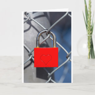 Red heart lock on fence holiday card