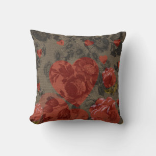 Red heart on beautiful vintage floral  cushion