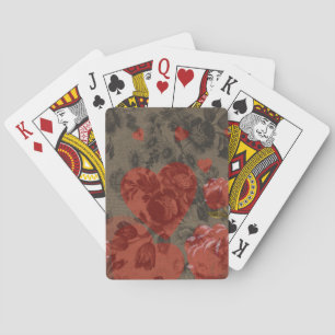 Red heart on beautiful vintage floral playing cards