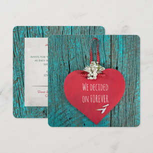red heart on turquoise wood wedding invitation