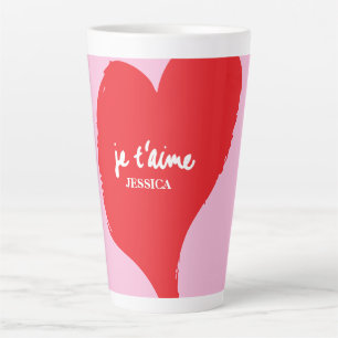 Red heart with je t’aime-text on pink background latte mug