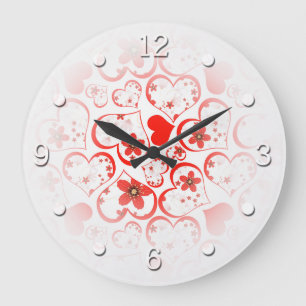 Red hearts and flowers on a white large clock