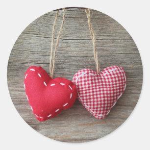 Red Hearts on Wooden Table 2 Classic Round Sticker
