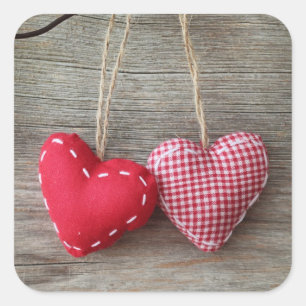 Red Hearts on Wooden Table 2 Square Sticker