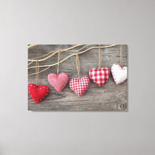 Red Hearts on Wooden Table Canvas Print