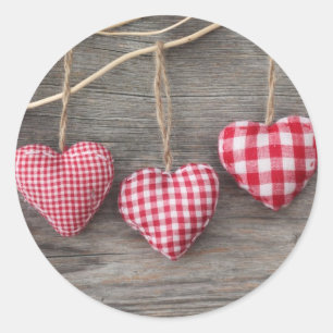Red Hearts on Wooden Table Classic Round Sticker