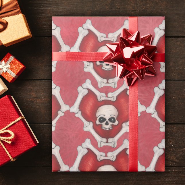 Red Hearts Outlined in Bones with Skulls in Centre Wrapping Paper (Deep red hearts outlined in bones with skull  inside on red starburst patterned roll wrapping paper.)