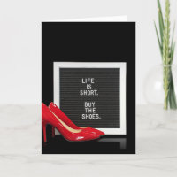 Red high heel shoes with message board