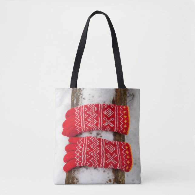 Red knitted gloves in snow tote bag (Front)