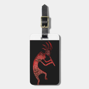 red kokopelli on black background luggage tag