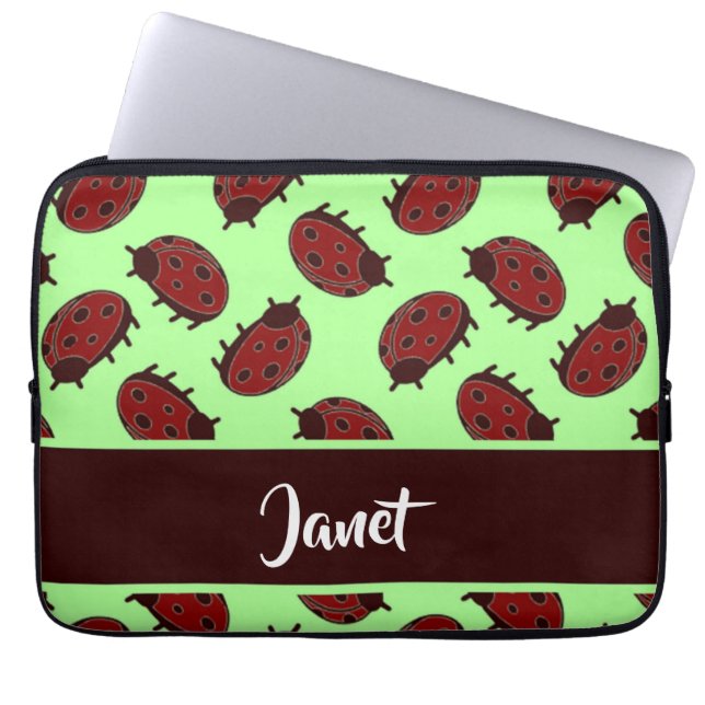 Red ladybugs on green laptop sleeve (Front)