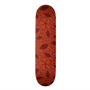 Red leaves pattern on orange skateboard