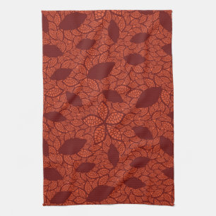 Red leaves pattern on orange tea towel