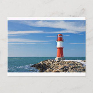 Red lighthouse with blue sky postcard