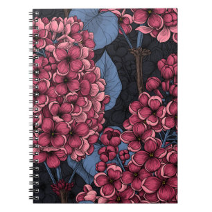 Red lilac on dark blue notebook