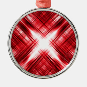 Red lines cross metal tree decoration