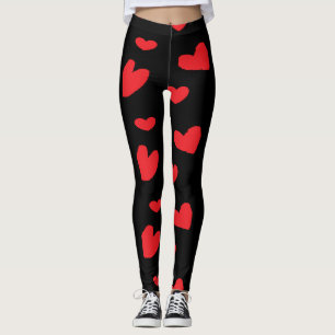 Red love hearts on black leggings